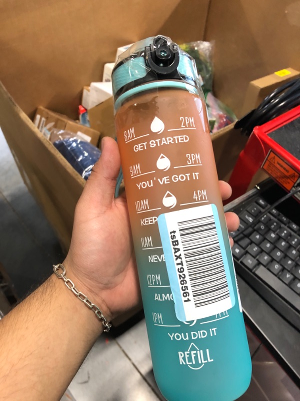 Photo 1 of **USED** Enerbone 32 OZ Water Bottle, Leakproof BPA & Toxic Free, Motivational Water Bottle with Times to Drink and Straw, Fitness Sports Water Bottle with Strap for Office, Gym, Outdoor Sports Orange-Green