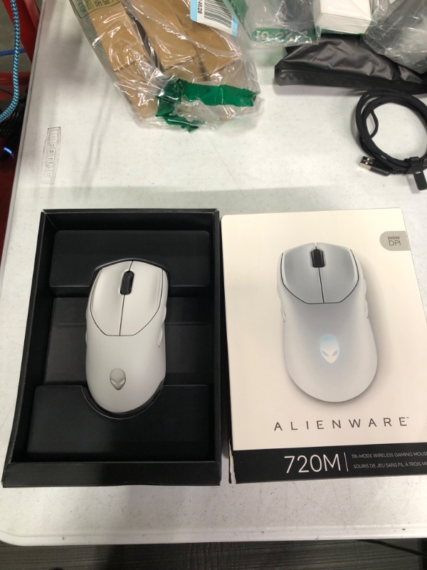 Photo 1 of Alienware AW720M Tri-Mode Wireless Gaming Mouse - 2.4GHz Wireless, Bluetooth 5.1, 26,000 DPI, 8-Fully Programmable Buttons, Magnetic Snap Charging Adapter USB-A to USB-C Cable - Lunar Light Wireless Gaming Mouse Lunar Light