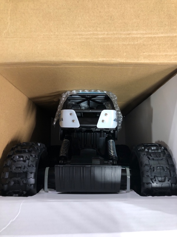 Photo 2 of *Brand New* DOUBLE E RC Car 1:12 Remote Control Car Monster Trucks 4WD Off Road RC Truck with Head Lights All Terrain Electric Vehicles Multicolored