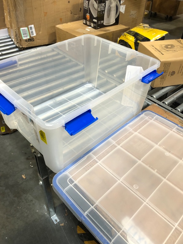 Photo 2 of ** USED**   ** DAMAGED HANDLE ** IRIS USA 60 Quart WEATHERPRO Plastic Storage Box with Durable Lid and Seal and Secure Latching Buckles, Clear With Blue Buckles, Weathertight, 3 Pack 60 Quart - 1 pack 