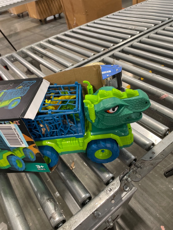 Photo 2 of  TEMI Dinosaur Truck Toys for Kids 3-5 Years, Tyrannosaurus Transport Car Carrier Truck with 8 Dino Figures, Activity Play Mat, Dinosaur Eggs, Trees, Capture Jurassic Play Set for Boys and Girls