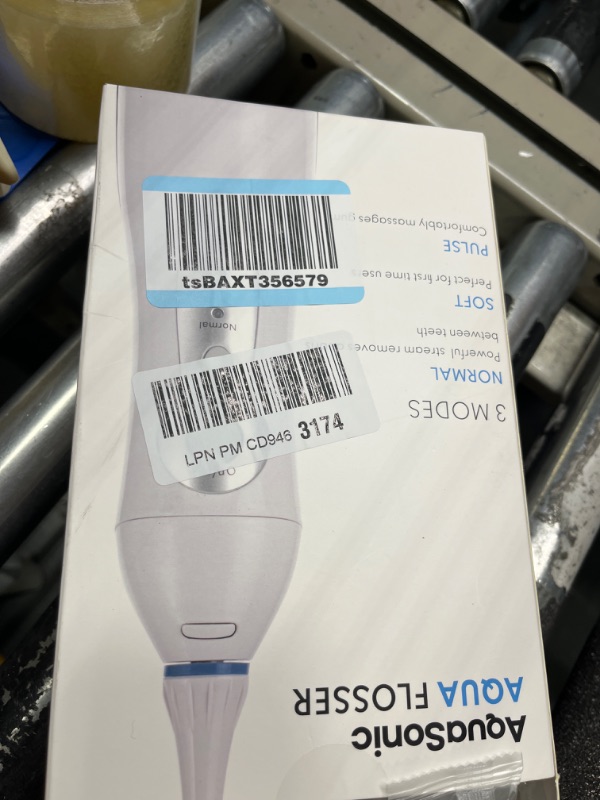Photo 2 of Aquasonic Aqua Flosser - Professional Rechargeable Water Flosser with 4 Tips - Oral Irrigator w/ 3 Modes - Portable & Cordless Flosser - Kids and Braces - Dentist Recommended White