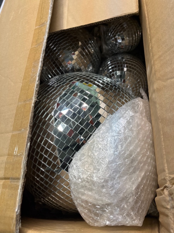 Photo 3 of 4 Pack Large Disco Ball Silver Hanging Disco Balls Reflective Mirror Ball Ornament for Party Holiday Wedding Dance and Music Festivals Decor Club Stage Props (12 Inch, 8 Inch, 6 Inch, 4 Inch)
