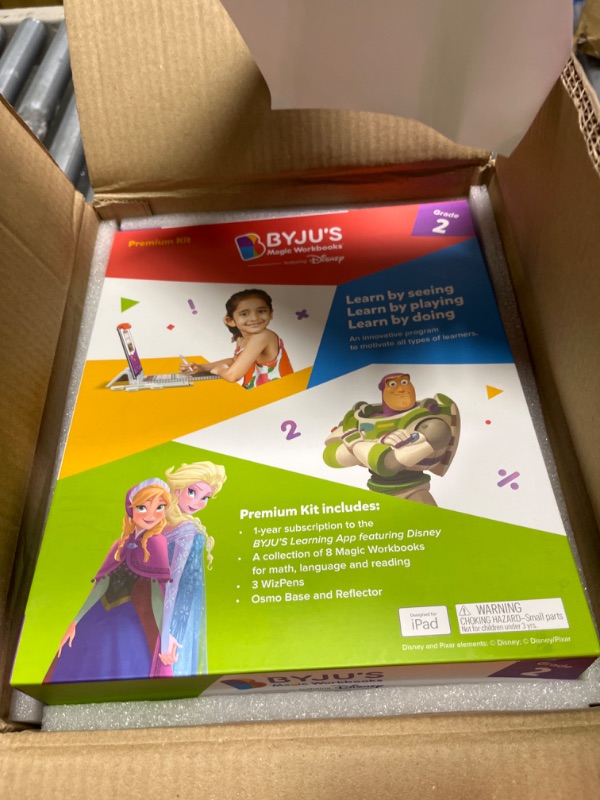 Photo 1 of BYJU’S Learning Kits: Disney, 2nd Grade Premium Edition (App + 8 Workbooks) Ages 6-8, Featuring Disney & Pixar Characters - Learn Grammar, Multiplication/Division & Writing - Osmo iPad Base Included iPad 2nd Grade