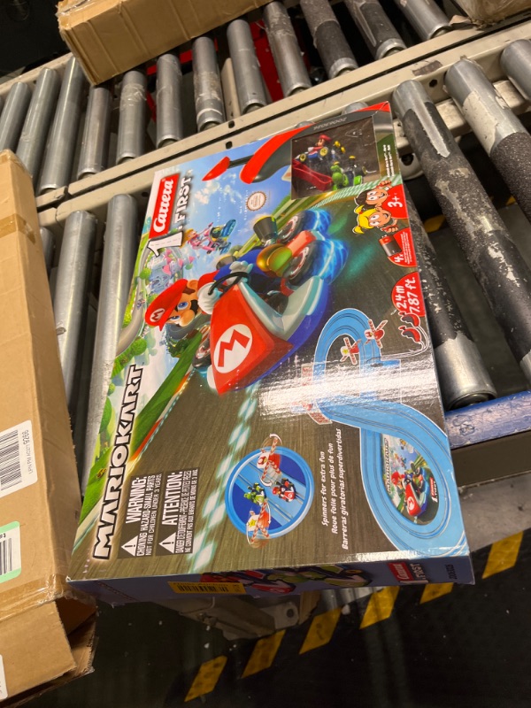 Photo 1 of Carrera First Mario Kart - Slot Car Race Track With Spinners - Includes 2 Cars: Mario and Yoshi - Battery-Powered Beginner Racing Set for Kids Ages 3 Years and Up Mario Kart w/ Spinners