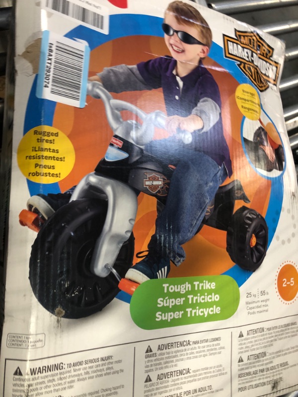 Photo 2 of Fisher-Price Harley-Davidson Tricycle with Handlebar Grips and Storage Area, Multi-Terrain Tires, Tough Trike [Amazon Exclusive]