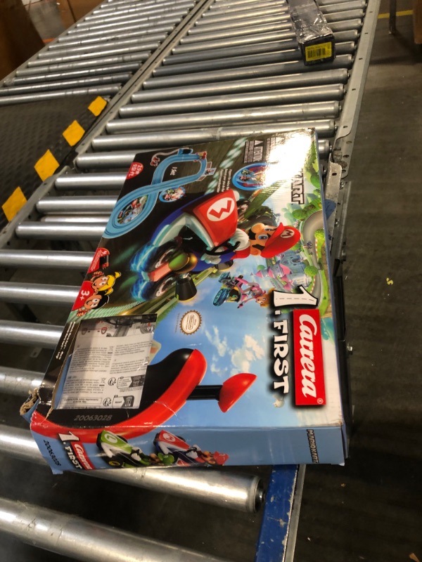 Photo 4 of Carrera First Nintendo Mario Kart Slot Car Race Track - Includes 2 Cars: Mario and Luigi and Two-Controllers - Battery-Powered Beginner Set for Kids Ages 3 Years and Up, 20063028 Mario Kart / Flippers