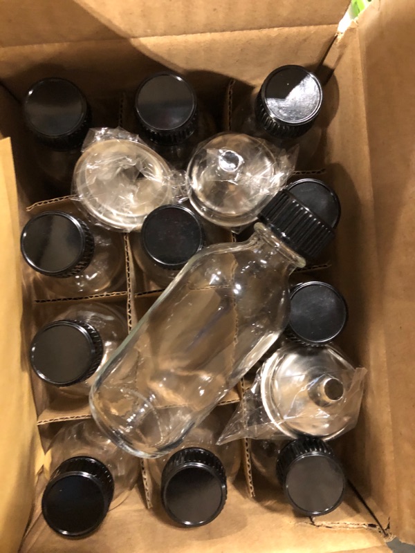 Photo 2 of 12, 2 oz Small Clear Glass Bottles (60ml) with Lids & 3 Stainless Steel Funnels - Boston Round Sample Bottles for Potion, Juice, Ginger Shots, Oils, Whiskey, Liquids - Mini Travel Bottles, NO Leakage
