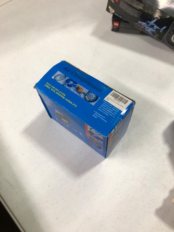 Photo 1 of Portable Compressor Tire Inflator with Mechanical Pressure Gauge,with 3 Nozzle Adapters,Inflator for Car Tires, Motorcycle, Bike, Basketball, Other Types of inflatables