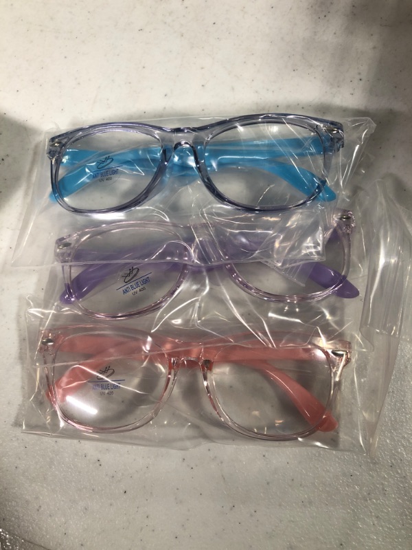 Photo 1 of FANNYGO 3 Pack kids Blue Light Blocking Glasses for girls boys Computer Blue Light Blocking Glasses Age 3-11 Light Blue + Light Purple + Light Pink