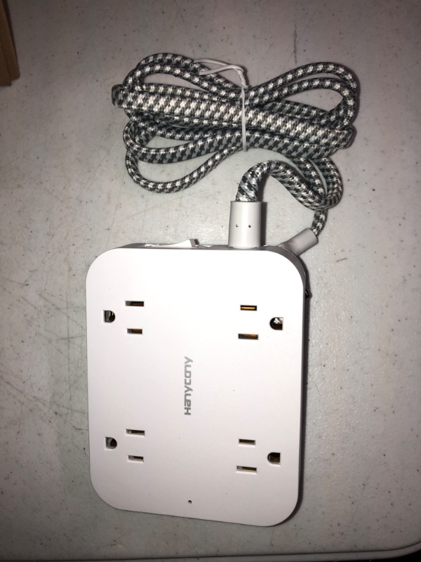 Photo 1 of Flat Plug Extension Cord, 5ft Power Strip with 4 USB Ports(2 USB C), 4 Widely Outlets Extender, Wall Mount, Desk Charging Station for Office, School, Travel and Dorm Room Essentials, White, ETL Listed