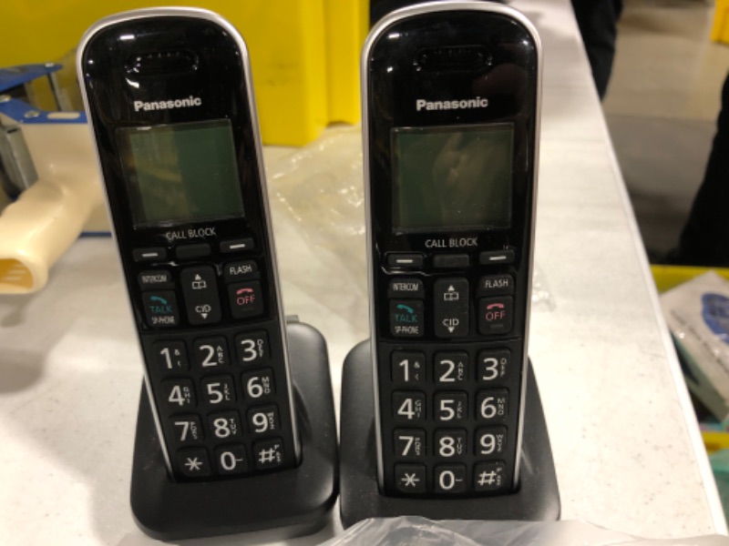 Photo 3 of Panasonic Expandable Corded/Cordless Phone System with Answering Machine and One Touch Call Blocking – 2 Handsets - KX-TGB852B (Black) Corded/Cordless Phone System, 2 Cordless Handsets
BOX HAS  MAJOR DAMAGE