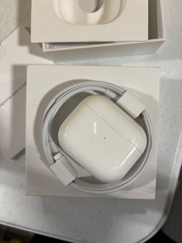 Photo 2 of Apple AirPods (3rd Generation) Wireless Ear Buds, Bluetooth Headphones, Personalized Spatial Audio, Sweat and Water Resistant, Lightning Charging Case Included, Up to 30 Hours of Battery Life
