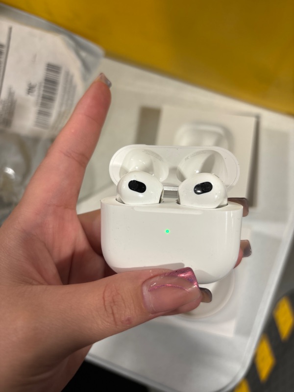 Photo 3 of Apple AirPods (3rd Generation) Wireless Ear Buds, Bluetooth Headphones, Personalized Spatial Audio, Sweat and Water Resistant, Lightning Charging Case Included, Up to 30 Hours of Battery Life
