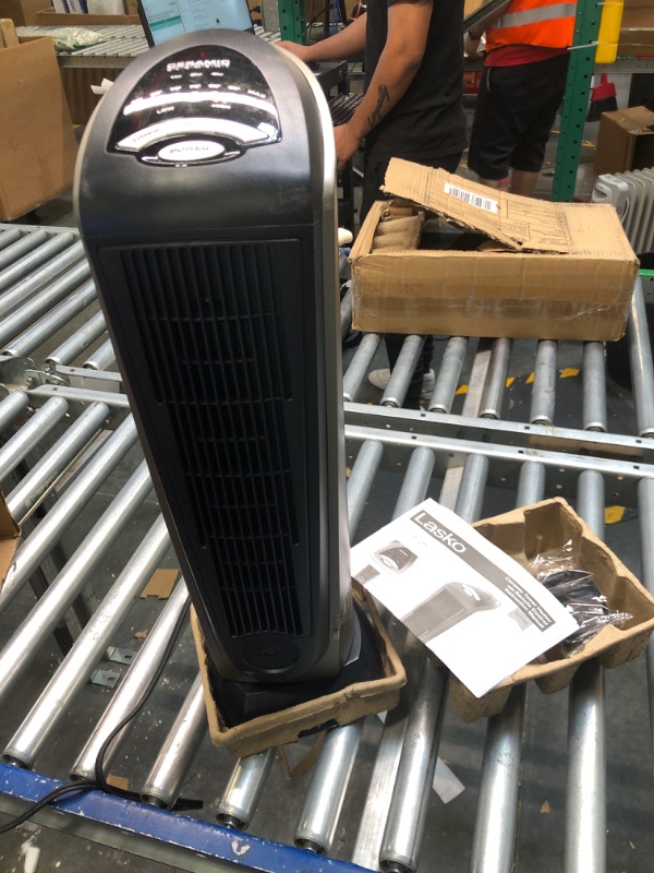 Photo 2 of ***tested functional***Lasko front bottom lable is off**   Lasko Products Lasko 1500 Watt 2 Speed Ceramic Oscillating Tower Heater with Remote