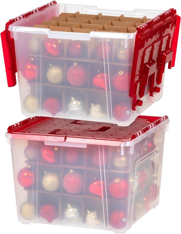 Photo 1 of **USED FOR PARTS** IRIS USA Ornament Storage Box with Attached Lid, Stores 75 Ornaments per Bin, 2-Pack, Stackable Durable Christmas Storage Organization Container Bin for Holiday Decorations and Accessories, Clear/Red