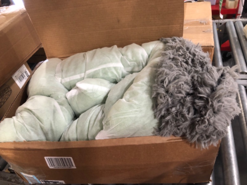 Photo 2 of Furhaven Plush Long Faux Fur Ultra Calming Donut Dog Bed - Gray, Medium Long Faux Fur (Gray) Medium Donut Bed