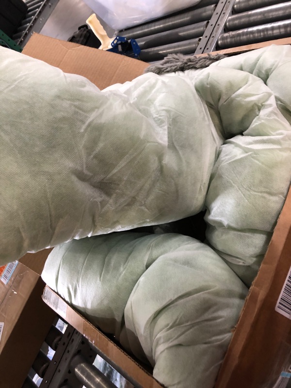 Photo 3 of Furhaven Plush Long Faux Fur Ultra Calming Donut Dog Bed - Gray, Medium Long Faux Fur (Gray) Medium Donut Bed