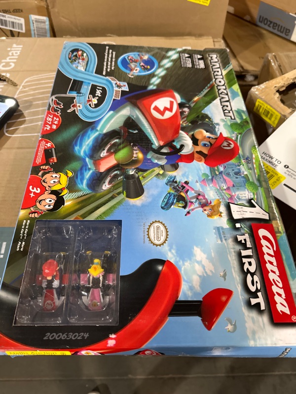 Photo 1 of Carrera First Mario Kart - Slot Car Race Track with Spinners - Includes 2 Cars: Mario and Peach - Battery-Powered Beginner Racing Set for Kids Ages 3 Years and Up Mario Kart w/ Peach