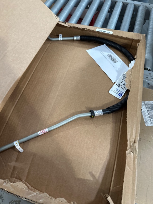 Photo 1 of GM Genuine Parts 15112871 Engine Oil Cooler Inlet Hose Kit with Nut, Seal, Protector, and Cap