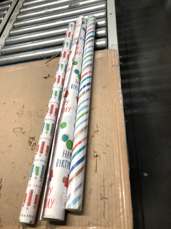 Photo 1 of Hallmark Recycled Wrapping Paper with Cutlines on Reverse (3 Rolls: 60 Sq. Ft. Ttl) Red, Blue, Green, Gold Stripes, Candles, "Happy Birthday" for Kids and Adults White, Red, Green