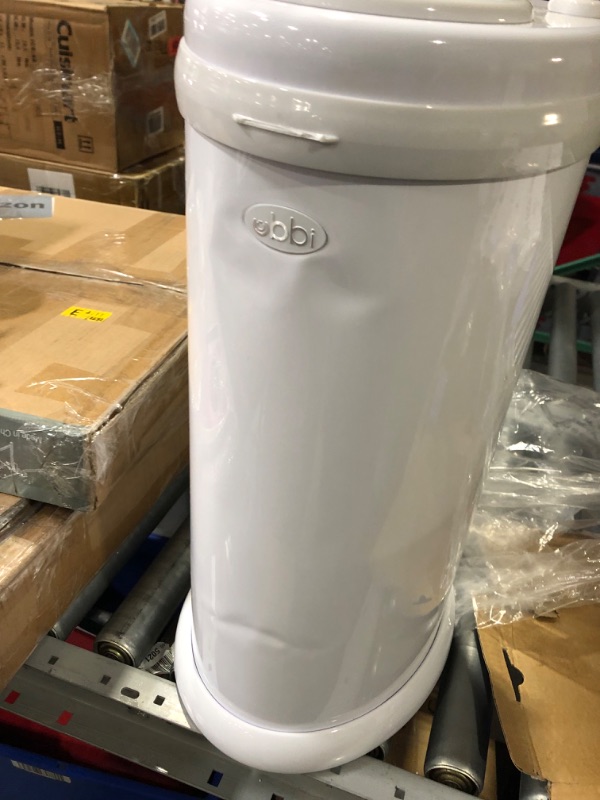 Photo 4 of **MINOR DAMAGE DENTED STILL FUNCTIONAL**
Ubbi Steel Odor Locking, No Special Bag Required Money Saving, Awards-Winning, Modern Design, Registry Must-Have Diaper Pail, White