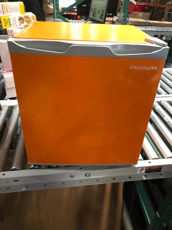 Photo 4 of **BROKEN LINE UNKNOWN IF FUNCTIONAL PARTS ONLY** Frigidaire EFR115-ORANGE 1.6 Cu Ft Compact Fridge for Office, Dorm Room, Mancave or RV, Orange
