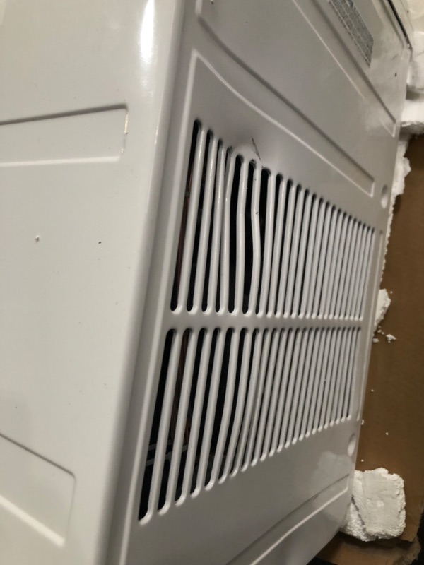 Photo 12 of ***MAJOR DAMAGE - BENT - UNTESTED - SEE COMMENTS***
Keystone KSTHW25B 23,200 Wall Air Conditioner with 16,000 Supplemental Heat and Dehumidifier, 230V, Window AC for Large Rooms up to 1,500 Sq.Ft. with Smart Remote Control, 23200 BTU, Bright White