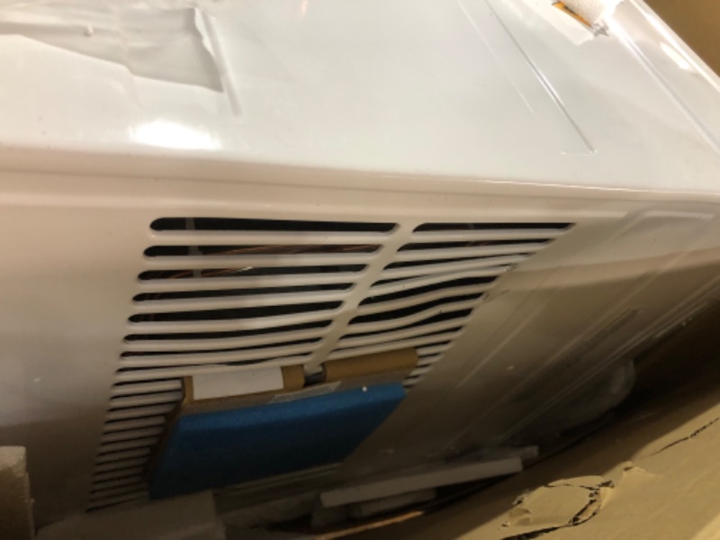 Photo 2 of ***MAJOR DAMAGE - BENT - UNTESTED - SEE COMMENTS***
Keystone KSTHW25B 23,200 Wall Air Conditioner with 16,000 Supplemental Heat and Dehumidifier, 230V, Window AC for Large Rooms up to 1,500 Sq.Ft. with Smart Remote Control, 23200 BTU, Bright White