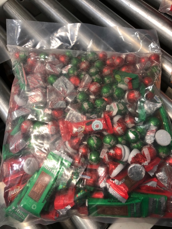 Photo 1 of **NON-REFUNDABLE** BEST BY 7/2024
Christmas Candy - 5 LB Bulk Holiday Chocolate Candy Mix - Hershey's Kisses, Hershey's Miniatures, Kit Kat Mini, Rolo, etc