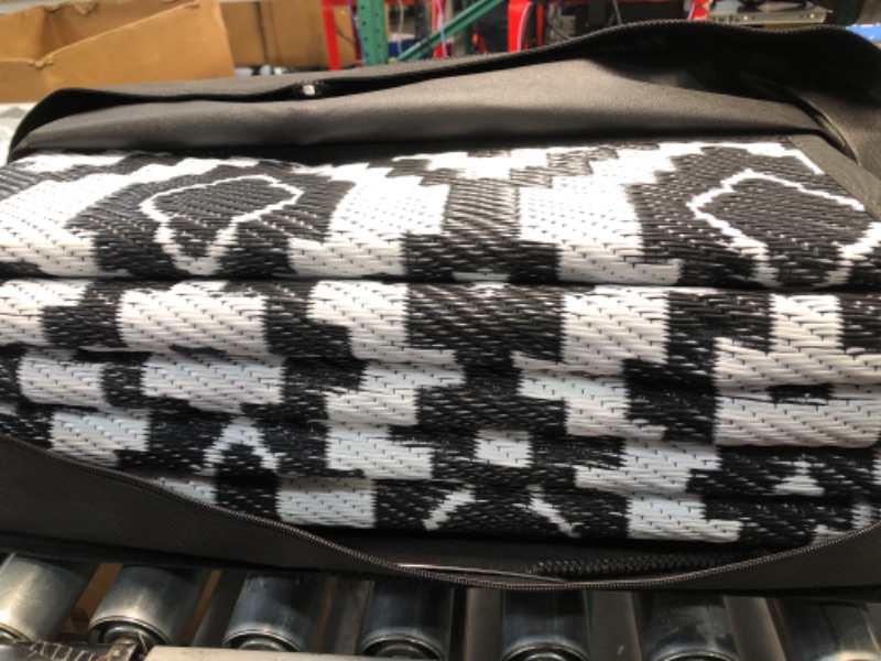 Photo 1 of ***USED - NO PACKAGING - SEE PICTURES***
HIHEGD Outdoor Rug 9x12 for Patio Camping RV, Waterproof Reversible Mat, Plastic Straw Rug for Indoor Outdoor Patio Clearance, Porch, Deck, Backyard, Picnic (Black and White) 9 x 12 Ft Black & White