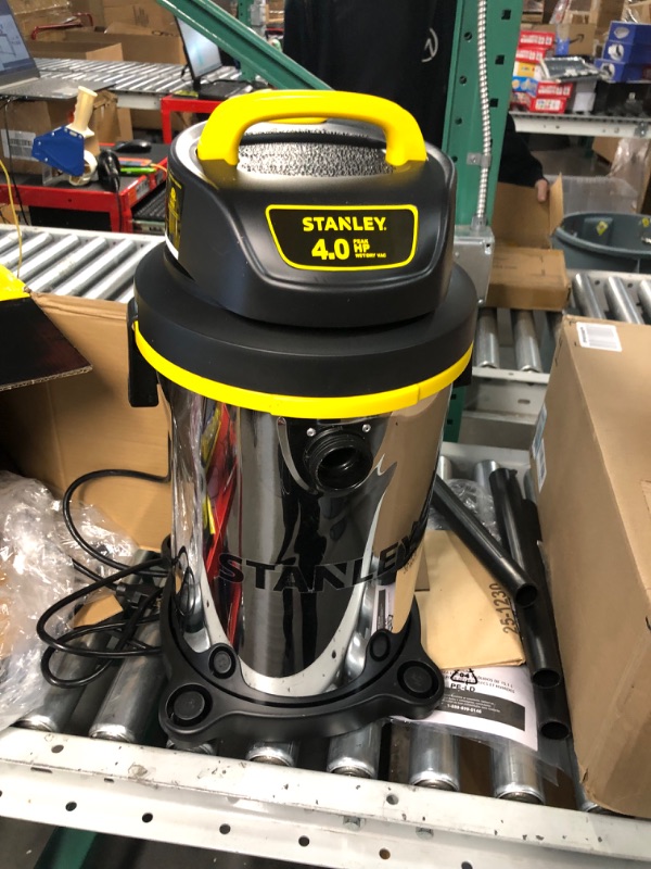 Photo 2 of **DIRTY HEAVILY USED** Stanley - SL18129 Wet/Dry Vacuum, 4 Gallon, 4 Horsepower, Stainless Steel Tank Silver+yellow