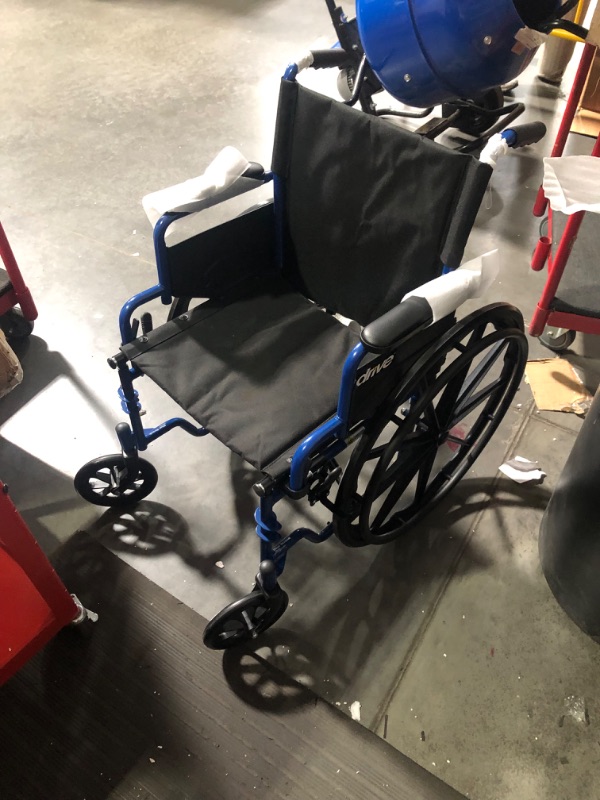 Photo 4 of ***USED - MISSING FOOT RESTS - SEE PICTURES - NO PACKAGING***
Drive Medical Blue Streak Ultra-Lightweight Wheelchair With Flip-Backs Arms & Swing-Away Footrests