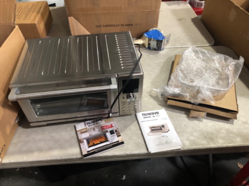 Photo 5 of ***USED - POWERS ON - UNABLE TO TEST FURTHER***
Nuwave Bravo XL Pro Air Fryer Toaster Oven, Improved 100% Super Convection, Quicker & Crispier Results, 112 Foolproof Presets, Multi-Layer Even Cooking, 50-500F, Smart Probe, 30QT, Stainless Steel