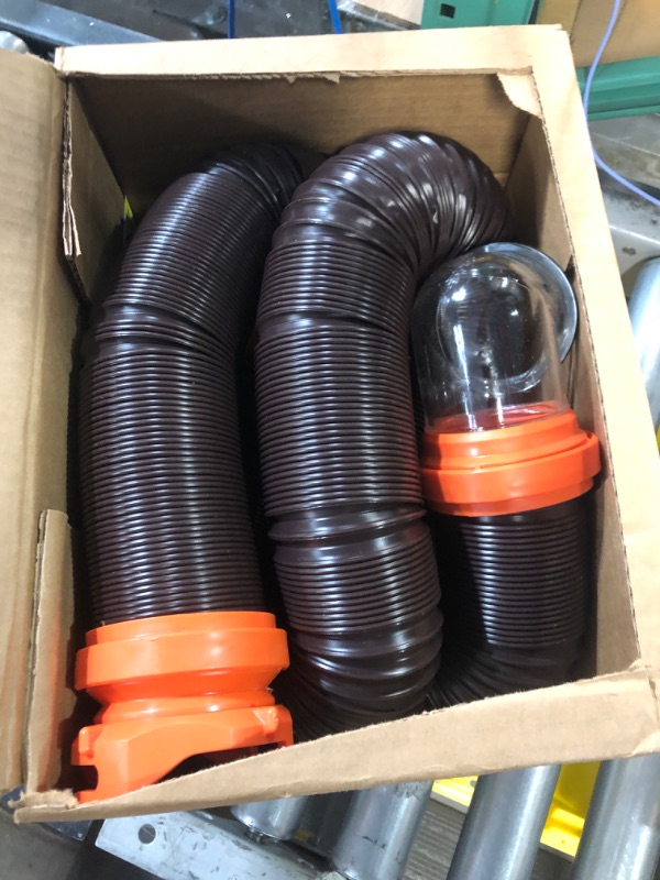 Photo 2 of Camco RhinoFLEX RV Sewer Hose Kit with Swivel Transparent Elbow and 4-in-1 Dump Station Fitting, Brown, 15 Feet (39770) 15ft Sewer Hose Kit Frustration-Free Packaging