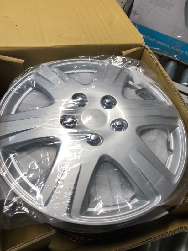 Photo 2 of Four ABS Plastic Silver Colored Hubcaps - 15 Inch Diameter