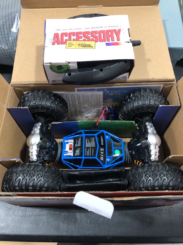 Photo 2 of BEZGAR TD141 RC Cars-1:14 Scale Remote Control Crawler, 4WD Transform 15 Km/h All Terrains Electric Toy Stunt Cars RC Car Vehicle Truck Car with Rechargeable Battery for Boys Kids and Adults Blue