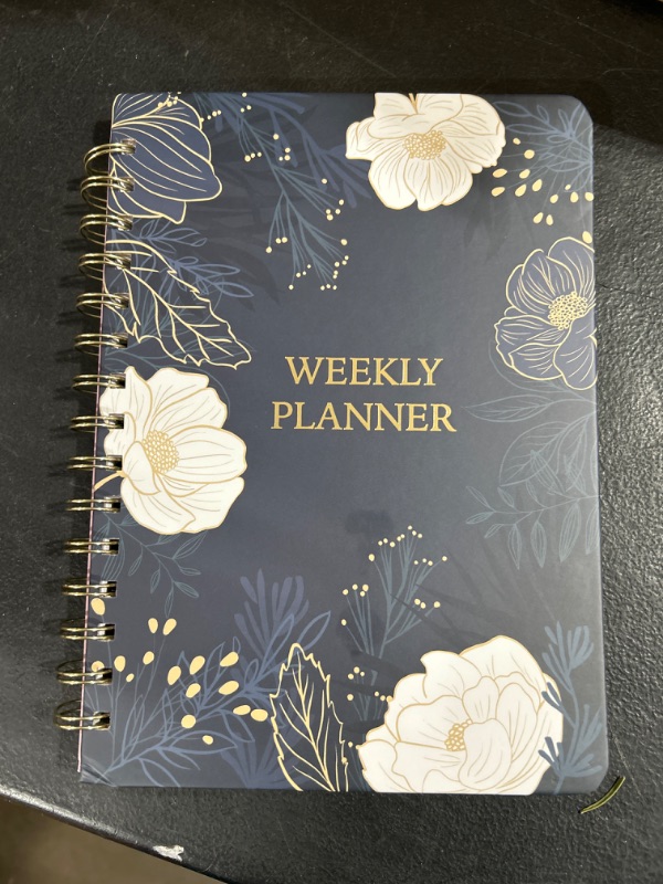 Photo 2 of Siltamu Premium Weekly Planner Undated 6.1? x 8.5? with Spiral Bound Weekly Goals Schedule, To Do List, and Habit Tracker Journal for Men & Women - 52 Weeks of Organization - White Flower A5-Weekly Planner White Flower