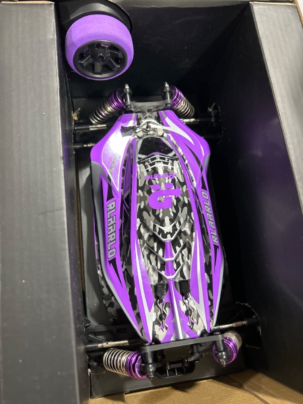 Photo 1 of RIAARIO 1:14 RTR Brushless Fast RC Cars for Adults, Max 63mph Hobby RC Truck, 4X4 Remote Control Car for Boys with Carbon Fiber Chassis & Metal Gear, Oil Filled Shocks Electric Vehicle Buggy for Kids 1:14 Brushless Purple