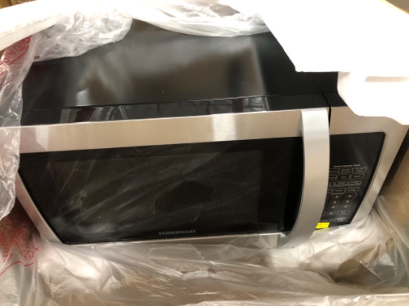 Photo 4 of 1.3 Cu. Ft. Stainless Steel Black 1100-Watt Microwave Oven with Sensor