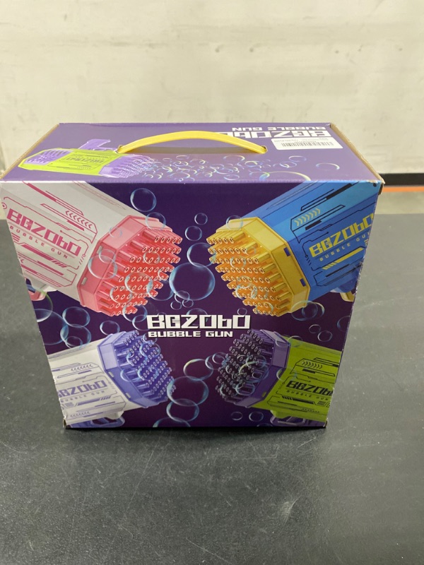 Photo 1 of Bazooka Bubble Gun, Bubble Machine with 2 Batteries, LED Lights, 69 Holes Bubble Machine Gun for Kids Ages 3 4 5 6 7 8 Boy Girl Birthday Party Favors Toddler Outdoor Toys - Bubble Blower Purple Purple Bubble Gun