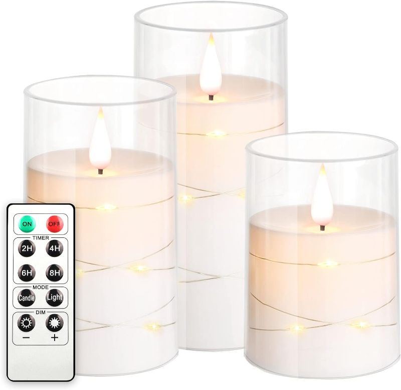 Photo 1 of  Flickering Flameless Candles: Built-in Star String Lights Unbreakable Acrylic 3D Wick Battery Operated LED Pillar Candles - Battery Candles with Remote and Timer 3 Pack Pure White