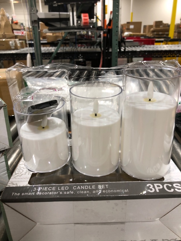 Photo 2 of  Flickering Flameless Candles: Built-in Star String Lights Unbreakable Acrylic 3D Wick Battery Operated LED Pillar Candles - Battery Candles with Remote and Timer 3 Pack Pure White