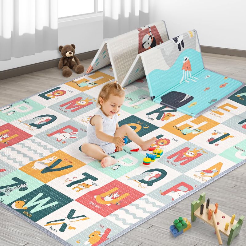 Photo 1 of Baby Play Mat 71" x 59", Foldable Baby Play Mats for Floor, Reversible Waterproof Foam Playmat for Babies and Toddlers, Large Non-Slip Baby Crawling Mat with Travel Bag
