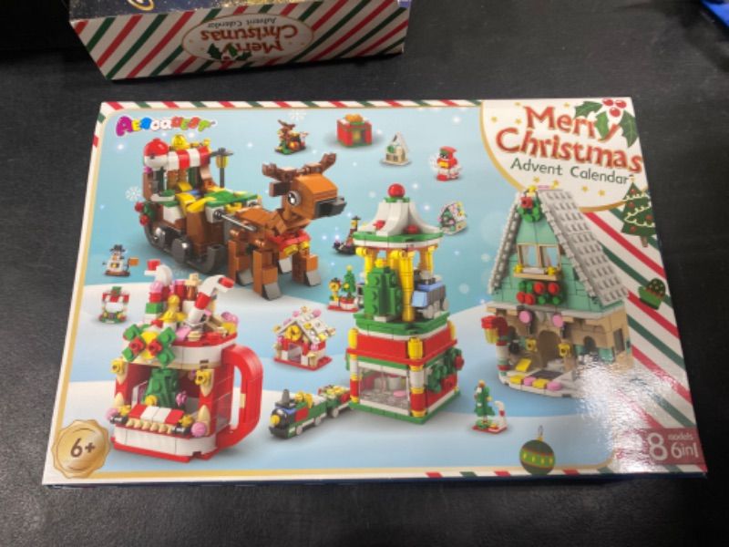 Photo 2 of AEROQUEST Advent Calendar 2023 - Toy Building Sets for Christmas Holiday Countdown Building Block Sets for kids Toy Gift Idea to Adventure with Daily Collectible Surprises(Christmas Sleigh) multicolored