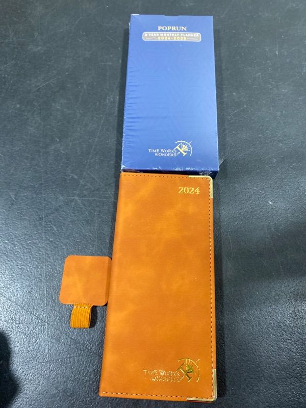 Photo 1 of POPRUN 2 Year Pocket Calendar 2024-2025 Monthly Notebook Planner for Purse 3" x 7" - 4 Pages per Month with Extra Notes, PU Leather Hard Cover, Gold-gilded Page Edges, Brown Brown 24 Months - Monthly Layout - 3'' x 7''