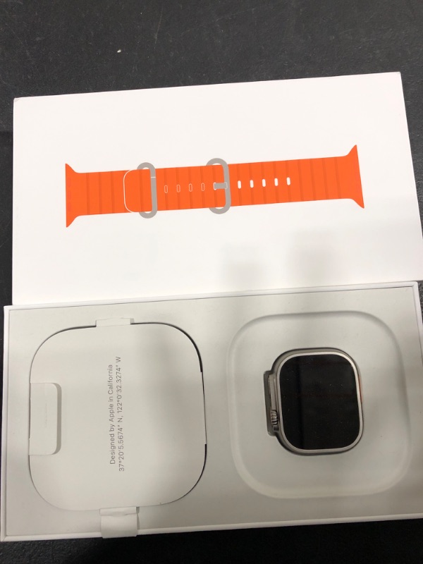 Photo 6 of Apple Watch Ultra 2 [GPS + Cellular 49mm] Smartwatch with Rugged Titanium Case & Orange Ocean Band. Fitness Tracker, Precision GPS, Action Button, Extra-Long Battery Life, Bright Retina Display Titanium Case with Orange Ocean Band One size - fits 130-200m