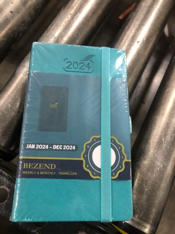 Photo 2 of Pocket 2024 Planner by BEZEND, Small Calendar for Purse 3.5" x 6", Daily Weekly and Monthly Agenda with Pen Holder, Vegan Leather Hard Cover - Turquoise