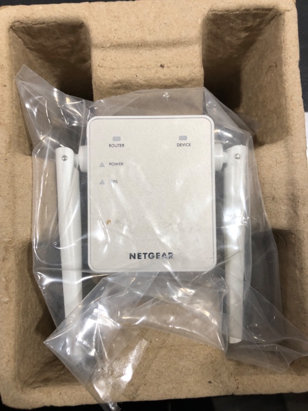 Photo 2 of NETGEAR Wi-Fi Range Extender EX6120 - Coverage Up to 1500 Sq Ft and 25 Devices with AC1200 Dual Band Wireless Signal Booster & Repeater (Up to 1200Mbps Speed), and Compact Wall Plug Design, White
