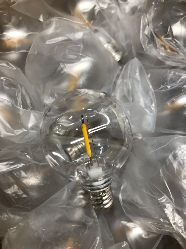 Photo 3 of ***USED - LIKELY MISSING PARTS - UNABLE TO VERIFY FUNCITONALITY***
Mlambert G40 LED Replacement Light Bulbs for String Lights, Dimmable E12 Base Shatterproof Bulbs, 1W Equal to 5W, Warm White 2700K, 25Pack, Not Solar Warm White 25 Count (Pack of 1)